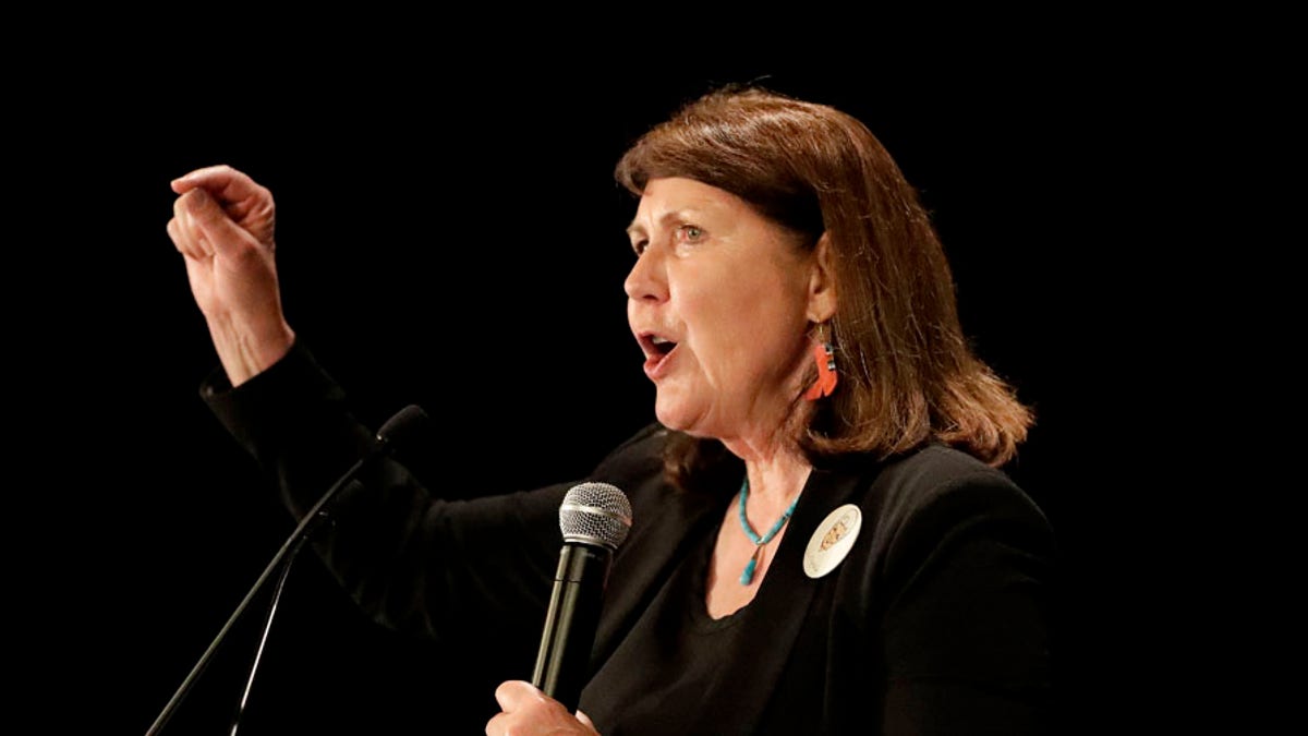 FILE - In this Nov. 8, 2016, file photo, Democratic senatorial candidate U.S. Rep. Ann Kirkpatrick, D-Ariz., speaks to supporters during an election night party in Phoenix. A judge has ruled Tuesday, June 19, 2018, congressional candidate Kirkpatrick can appear on the Aug. 28 primary ballot even though her residency information was incorrectly stated on some her campaign documents. A lawsuit funded by one of Kirkpatrick's opponents sought to kick her off the ballot. (AP Photo/Matt York, File)