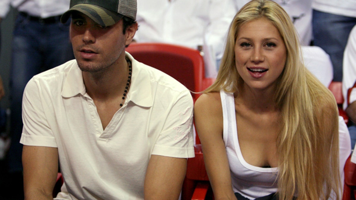 Beaten at love: Anna Kournikova playing singles again, report says