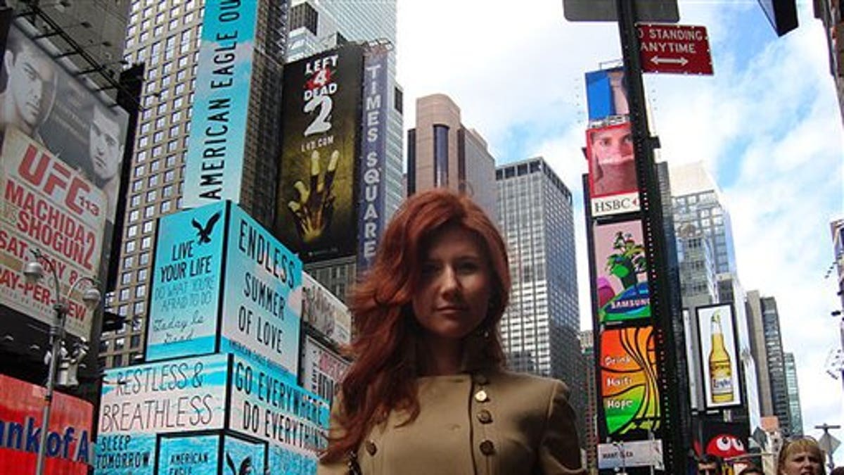 This undated image taken from the Russian social networking website "Odnoklassniki", or Classmates, shows a woman journalists have identified as Anna Chapman, who appeared at a hearing Monday, June 28, 2010 in New York federal court. Chapman, along with 10 others, was arrested on charges of conspiracy to act as an agent of a foreign government without notifying the U.S. attorney general. The caption on Odnoklassniki reads "Russia, Moscow. Left 4 dead???" (AP Photo)