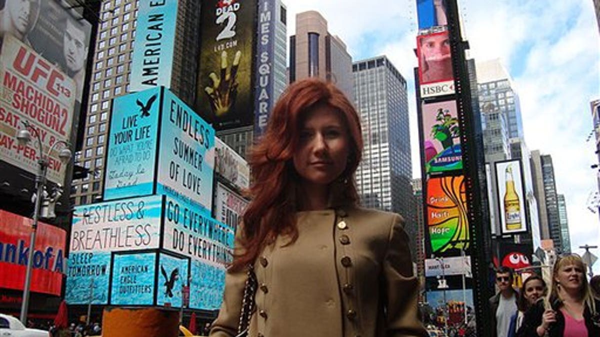 This undated image taken from the Russian social networking website "Odnoklassniki", or Classmates, shows a woman journalists have identified as Anna Chapman, who appeared at a hearing Monday, June 28, 2010 in New York federal court. Chapman, along with 10 others, was arrested on charges of conspiracy to act as an agent of a foreign government without notifying the U.S. attorney general. The caption on Odnoklassniki reads "Russia, Moscow. Left 4 dead???" (AP Photo)