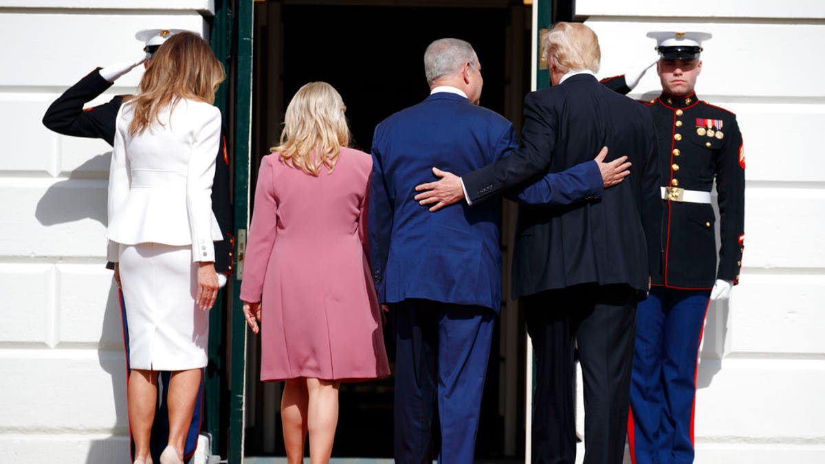 DAY 27 - In this Feb. 15, 2017, file photo, President Donald Trump, first lady Melania Trump, Israeli Prime Minister Benjamin Netanyahu and his wife Sara walk into the White House in Washington. (AP Photo/Evan Vucci, File)