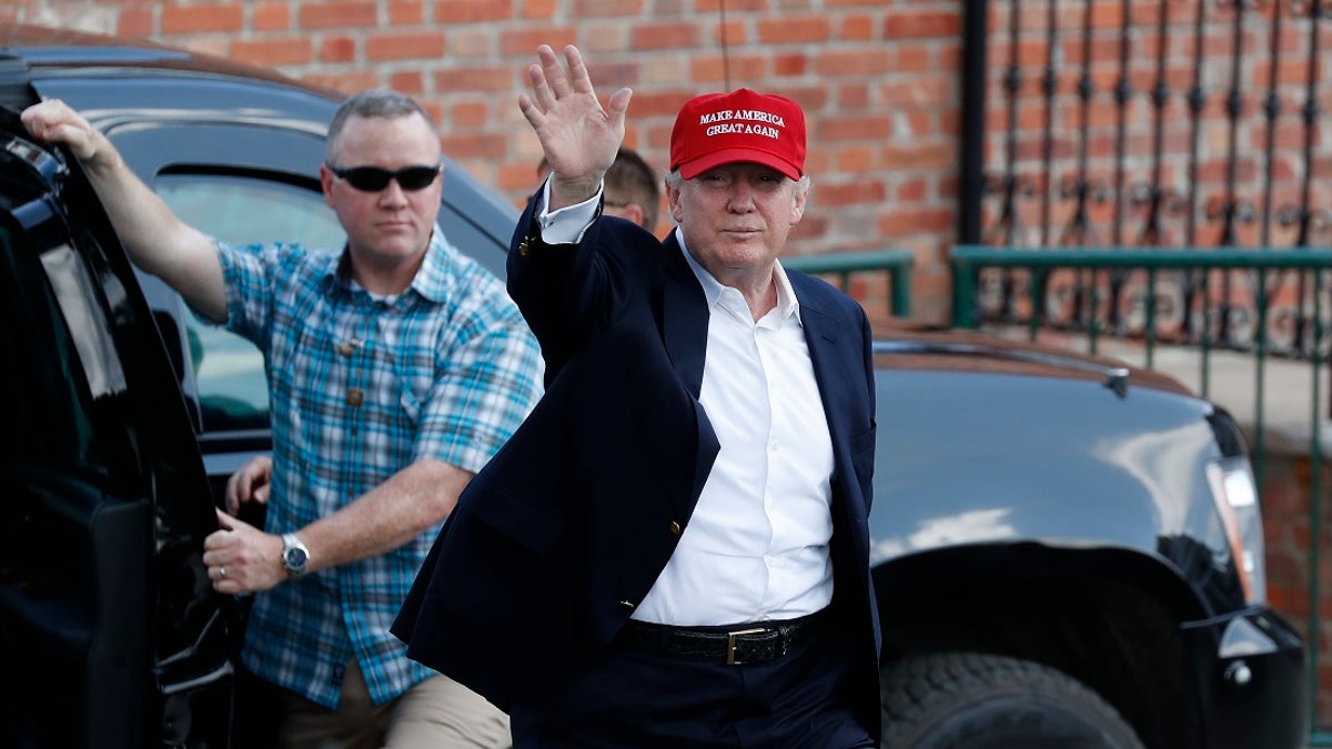 Former President Donald Trump waving