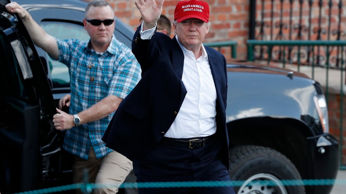 Former President Donald Trump waving