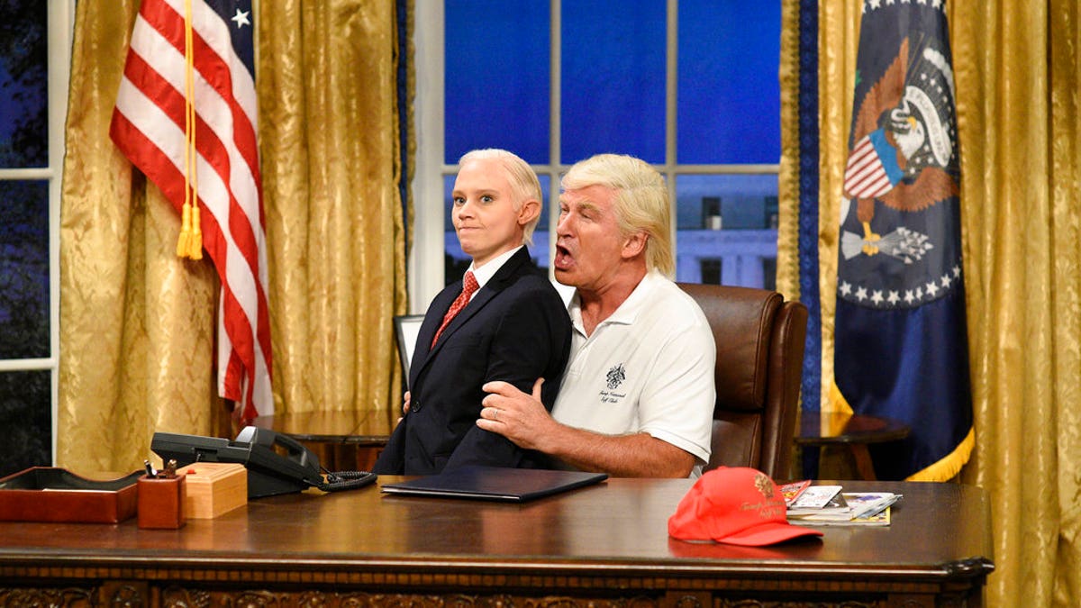 In this image released by NBC, Kate McKinnon portrays Attorney General Jeff Sessions, left, and Alec Baldwin portrays President Donald Trump during the cold open for 