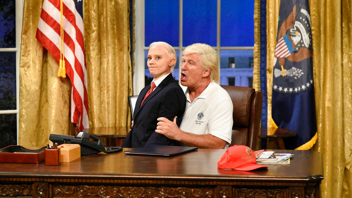 In this image released by NBC, Kate McKinnon portrays Attorney General Jeff Sessions, left, and Alec Baldwin portrays President Donald Trump during the cold open for 