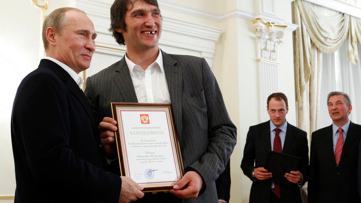 putin ovechkin ap