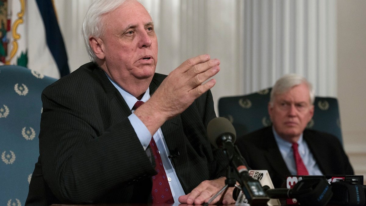 FILE - In this Tuesday, Feb. 27, 2018, file photo, West Virginia Gov. Jim Justice speaks during a news conference at the Capitol building in Charleston, W.Va. More than a third of U.S. states are considering legalizing sports gambling if the Supreme Court overturns a federal law that has banned sports books in all but Nevada and three other states since 1992. Earlier in March 2018, West Virginia passed a law authorizing sports betting in its casinos if the Supreme Court allows it. (Craig Hudson/Charleston Gazette-Mail via AP, File)