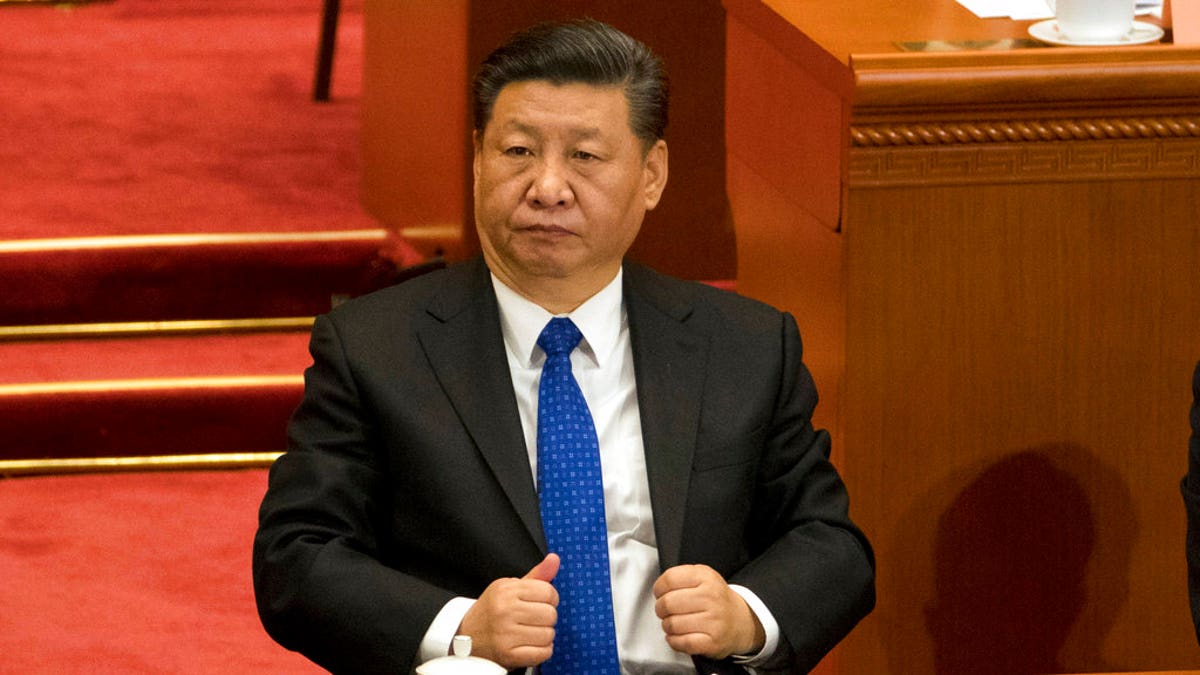 FILE - In this Saturday, March 3, 2018, file photo, Chinese President Xi Jinping attends the opening session of the Chinese People's Political Consultative Conference in Beijing's Great Hall of the People. The Chinese Communist Party's move to exert direct control over state broadcasters and regulators of everything from movies and TV to books and radio programs shows the partyâs drive to use the media for ideological efforts at home and to improve its image overseas, analysts say. (AP Photo/Ng Han Guan, File)
