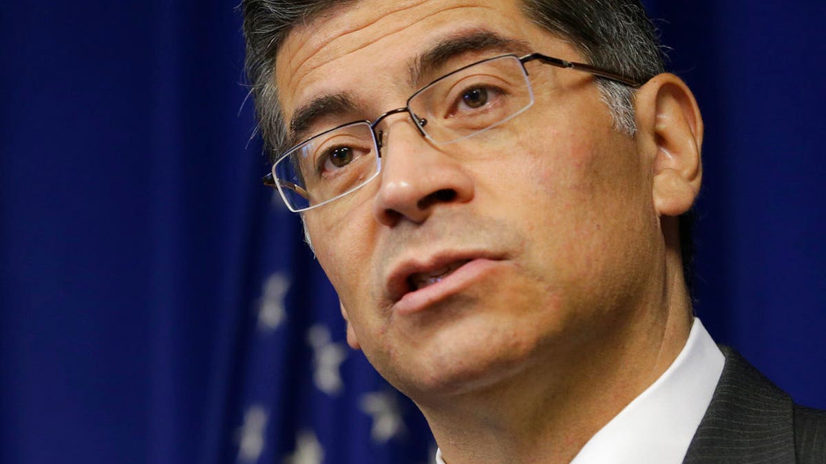 FILE - In this Jan. 18, 2018, file photo, California Attorney General Xavier Becerra speaks at a news conference in Sacramento, Calif. California is suing the Trump administration over its decision to add a question about citizenship to the 2020 U.S. Census. In announcing the lawsuit Tuesday, March 27 Becerra says adding such a question is a reckless decision that would violate the U.S. Constitution and cause a population undercount. (AP Photo/Rich Pedroncelli, File)