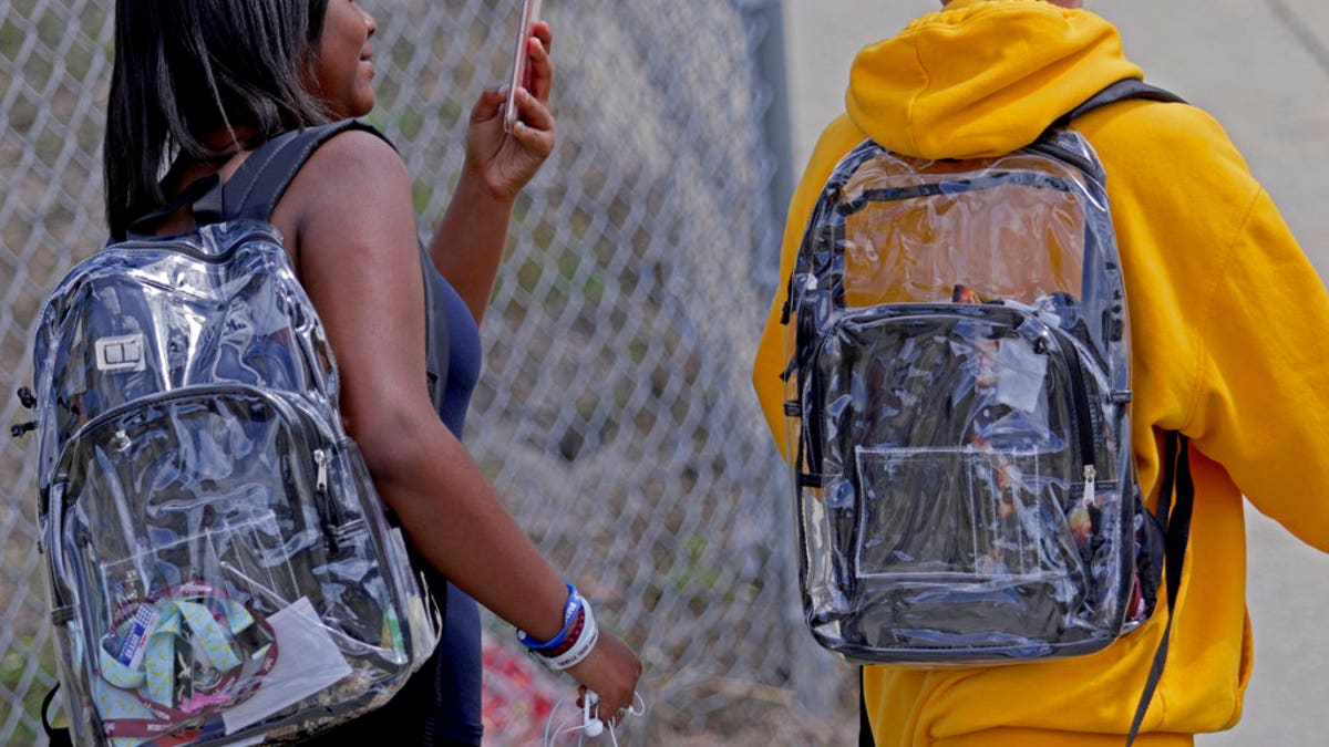 Stoneman Douglas students return to class carrying mandatory clear