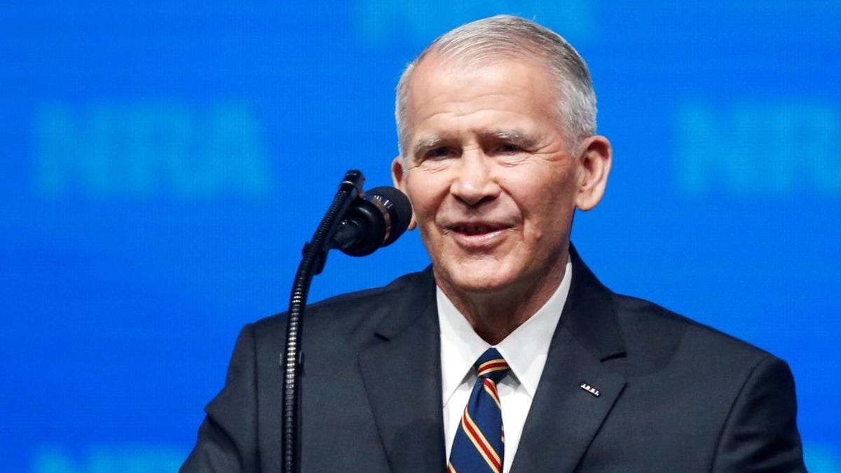 In this May 4, 2018 photo, former U.S. Marine Lt. Col. Oliver North speaks before giving the Invocation at the National Rifle Association-Institute for Legislative Action Leadership Forum in Dallas. The NRA announced today that North will become President of the National Rifle Association of America within a few weeks, a process the NRA Board of Directors initiated this morning. (AP Photo/Sue Ogrocki)
