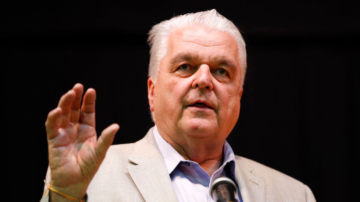 FILE - In this May 8, 2018 file photo, Clark County Commission member Steve Sisolak speaks during a forum for Nevada gubernatorial candidates in Las Vegas. The fiercest primary election battle in Nevada this year is a race between two Democrats vying to become the swing stateâs first Democratic governor in almost two decades. The fight between Sisolak and Christina Giunchigliani has seen them spar over their response to the October mass shooting in Las Vegas while pledging to resist President Donald Trump and the National Rifle Association. (AP Photo/John Locher, File)