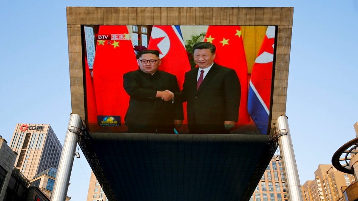 North Korean leader Kim Jong Un and Chinese President Xi Jinping during a welcome ceremony at the Great Hall of the People in Beijing, Tuesday, June 19, 2018. Kim is making a two-day visit to Beijing starting Tuesday and is expected to discuss with Chinese leaders his next steps after his nuclear summit with U.S. President Donald Trump last week. (AP Photo/Andy Wong)