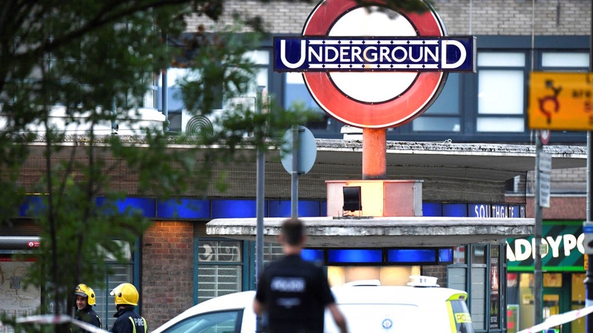 Emergency services attend the scene of a small explosion at Southgate Underground station, in London, Tuesday June 19, 2018. London police are investigating a small explosion at the Southgate Underground station that officials say does not seem to be related to terrorism. (Victoria Jones/PA via AP)