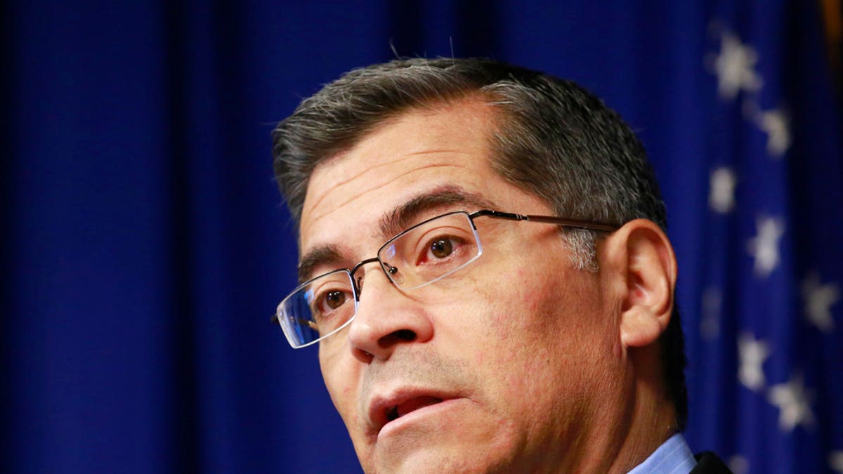 FILE - In this Feb. 20, 2018, file photo, California Attorney General Xavier Becerra speaks at a news conference in Sacramento, Calif. Gun owners' rights organizations filed a lawsuit, Wednesday, July 11, 2018, against Becerra and his Department of Justice alleging that the system for registering so-called bullet-button assault weapons was unavailable for most of the week before the July 1, 2018 deadline. The suit says owners who were unable to register by the deadline now potentially face prosecution through no fault of their own. (AP Photo/Rich Pedroncelli, File)