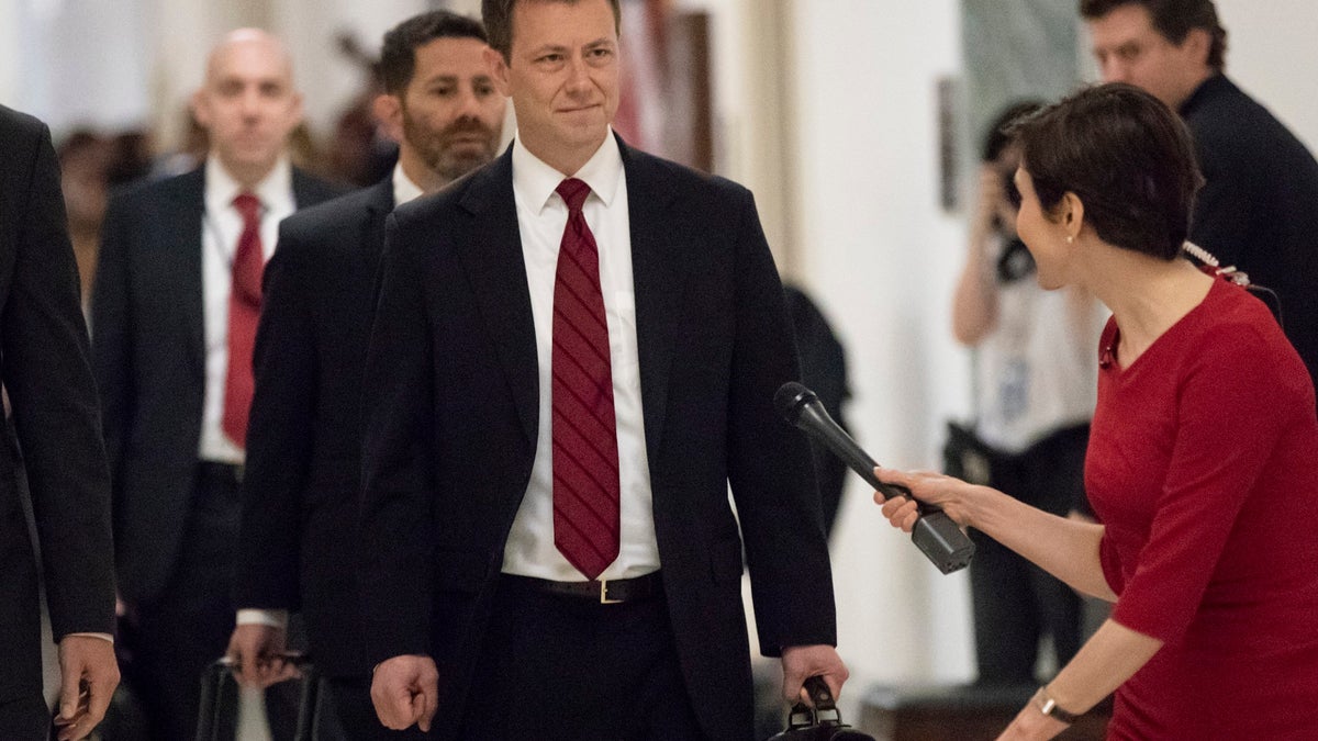 FILE - In this June 27, 2018, file photo, Peter Strzok, the FBI agent facing criticism following a series of anti-Trump text messages, walks to gives a deposition before the House Judiciary Committee on Capitol Hill in Washington. Strzok, whose anti-Trump text messages fueled suspicions of partisan bias will tell lawmakers July 12 that his law enforcement work has never been tainted by political considerations and that the intense congressional scrutiny of him represents âjust another victory notch in Putinâs belt,â according to prepared remarks obtained by The Associated Press.(AP Photo/J. Scott Applewhite, File)