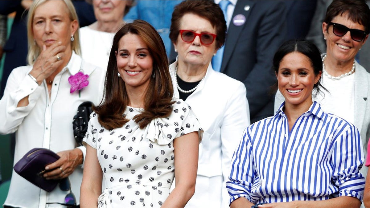 Kate, Duchess of Cambridge and Meghan, Duchess of Sussex, right, watch the women's singles final match between Serena Williams of the US and Angelique Kerber of Germany at the Wimbledon Tennis Championships, in London, Saturday July 14, 2018. (Nic Bothma, Pool via AP)