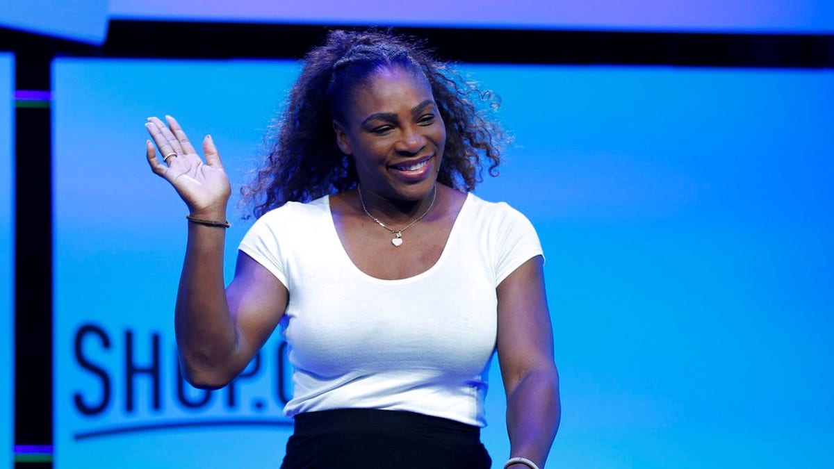 Tennis star Serena Williams walks on stage before speaking at the Shop.org conference Friday, Sept. 14, 2018, in Las Vegas. (AP Photo/John Locher)