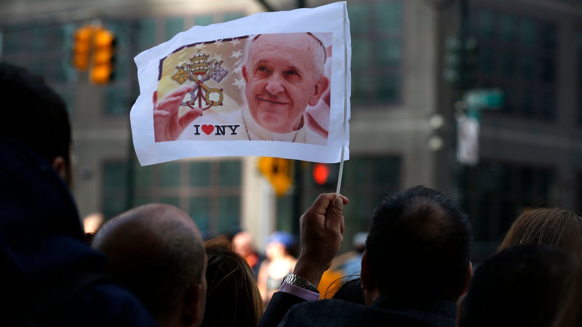 Pope Francis sign