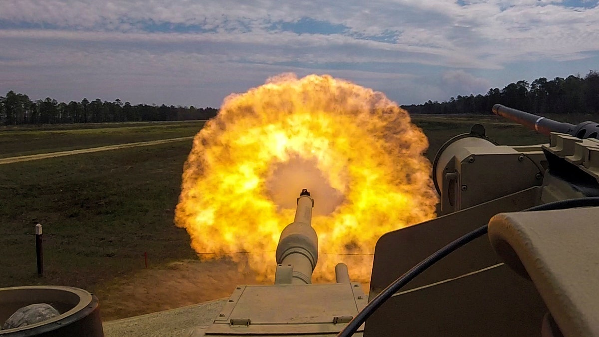 Troopers with the U.S. Army 2nd Armored Brigade Combat Team, 3rd Infantry Division fire the main gun round at a target during unit gunnery practice with newly acquired M1A1-SA Abrams tanks at Fort Stewart, Georgia, U.S. March 29, 2018. Picture taken March 29, 2018. U.S. Army/Handout via REUTERS.    ATTENTION EDITORS - THIS IMAGE WAS PROVIDED BY A THIRD PARTY - RC17E55928B0