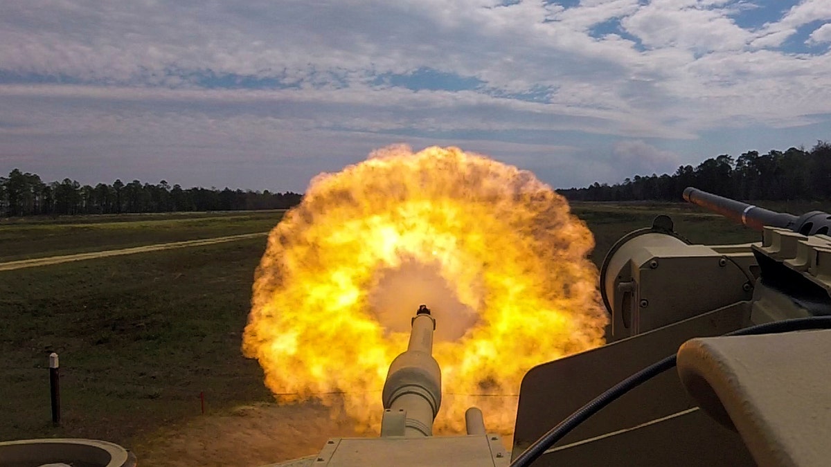 Troopers with the U.S. Army 2nd Armored Brigade Combat Team, 3rd Infantry Division fire the main gun round at a target during unit gunnery practice with newly acquired M1A1-SA Abrams tanks at Fort Stewart, Georgia, U.S. March 29, 2018. Picture taken March 29, 2018. U.S. Army/Handout via REUTERS.    ATTENTION EDITORS - THIS IMAGE WAS PROVIDED BY A THIRD PARTY - RC17E55928B0