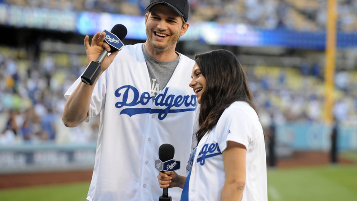 ashton kutcher mila kunis reuters