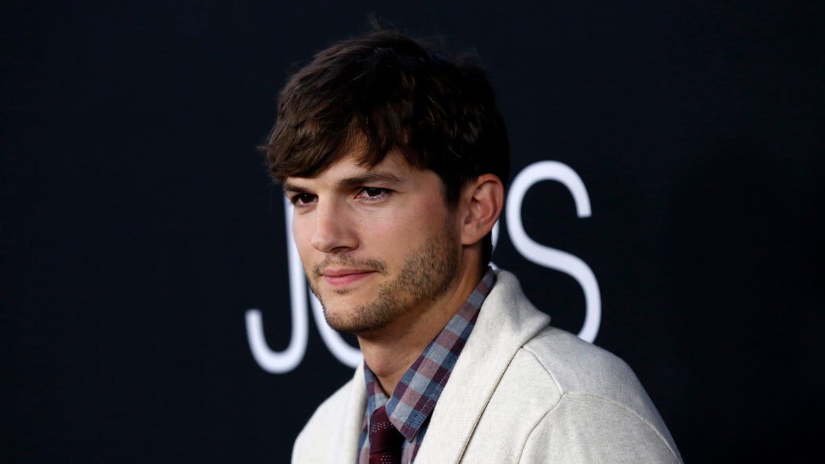 Cast member Ashton Kutcher poses at the premiere of 