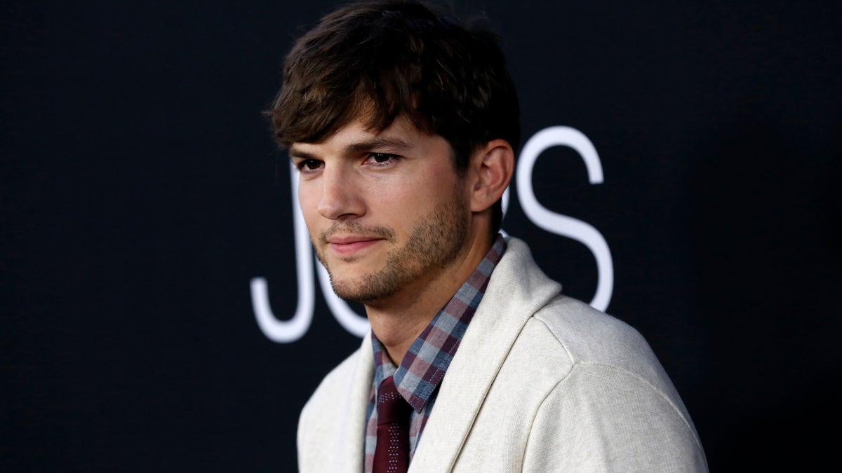 Cast member Ashton Kutcher poses at the premiere of 