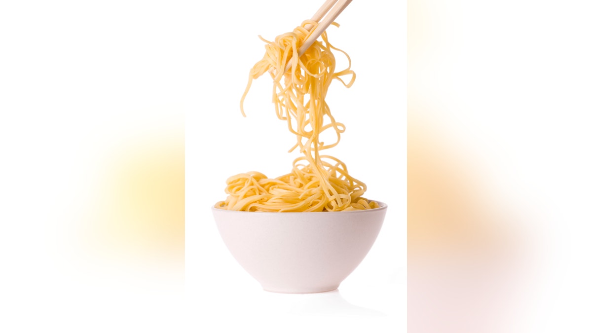 chopsticks,bowl and noodles