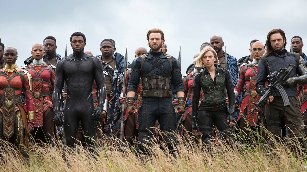 This image released by Marvel Studios shows, front row from left, Danai Gurira, Chadwick Boseman, Chris Evans, Scarlet Johansson and Sebastian Stan in a scene from 