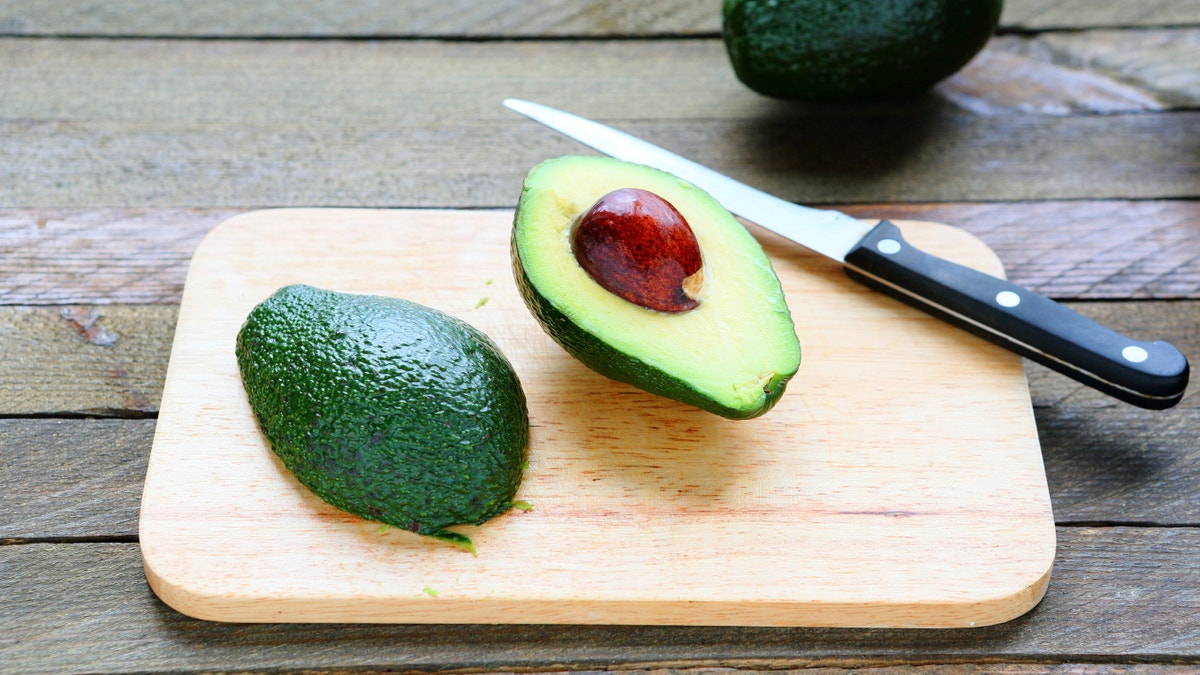 sliced u200Bu200Bavocado on a blackboard