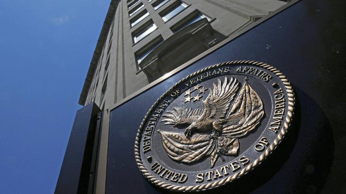 In this June 21, 2013, file photo, the seal affixed to the front of the Department of Veterans Affairs building in Washington.