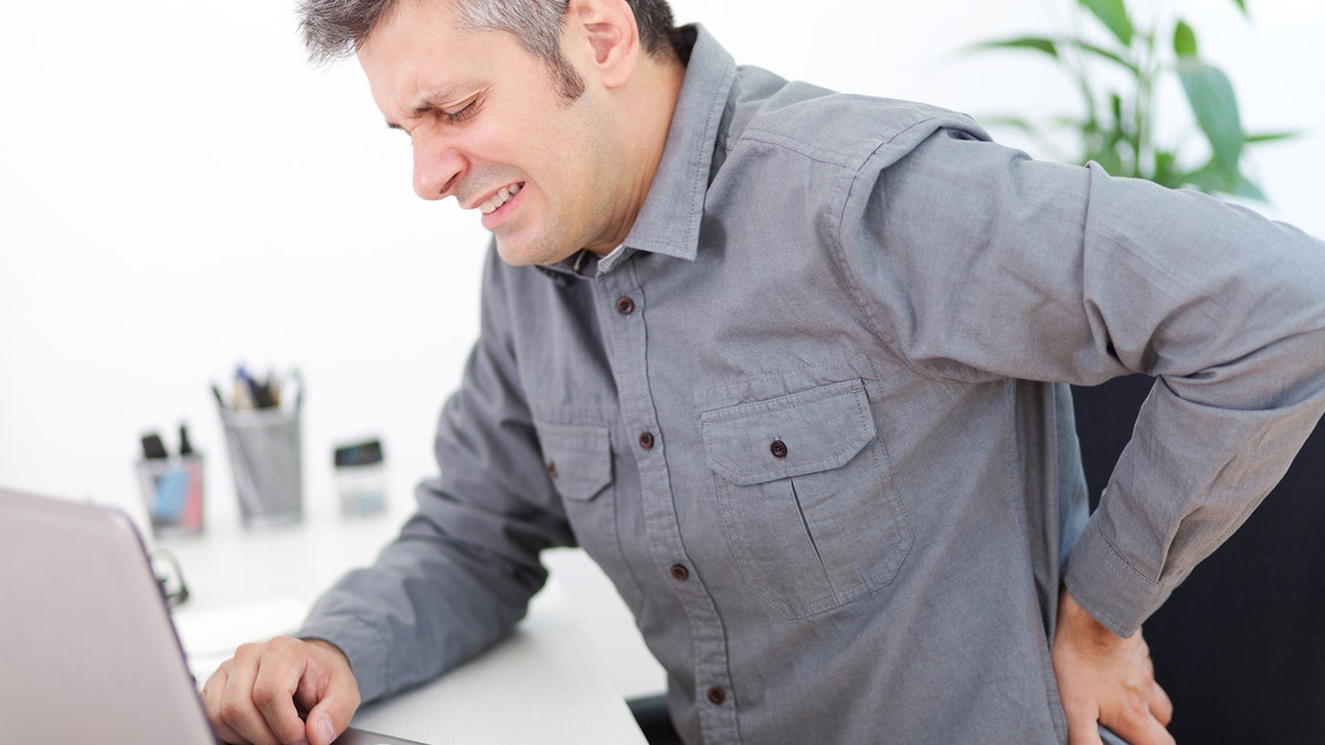 back pain at desk istock medium