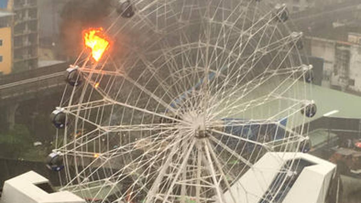 Ferris wheel catches fire at new dinosaur theme park in Bangkok