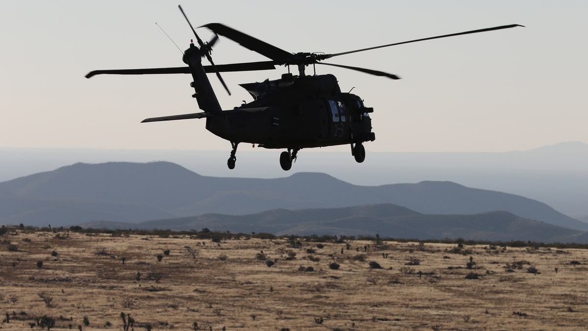 UH-60 Blackhawk helicopter crews from 3rd Battalion, 501st Aviation Regiment, Combat Aviation Brigade, 1st Armored Division completed aerial gunnery at Fort Bliss, Texas, December 12, 2017, maintaining their combat readiness and M240 machine gun skills.  U.S. Army photos by Capt. Tyson Friar, 1st Armored Division Combat Aviation Brigade Public Affairs