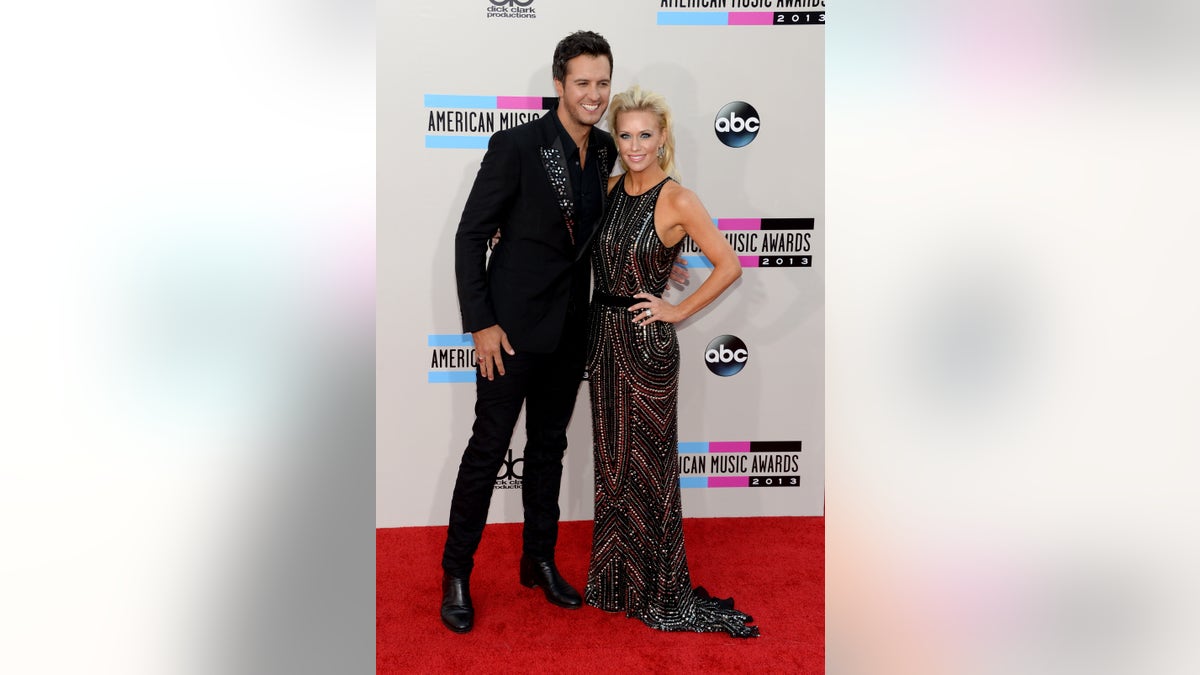 LOS ANGELES, CA - NOVEMBER 24: Singer Luke Bryan and wife Caroline Bryan attend the 2013 American Music Awards at Nokia Theatre L.A. Live on November 24, 2013 in Los Angeles, California. (Photo by Jason Kempin/Getty Images)