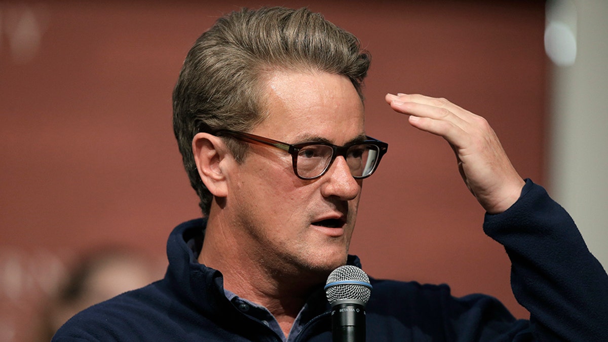 FILE - In this Oct. 11, 2017, file photo, MSNBC television anchor Joe Scarborough takes questions from an audience at forum at the John F. Kennedy School of Government, on the campus of Harvard University, in Cambridge, Mass. Scarborough announced Oct. 12, 2017, that he formally left the Republican party and became an independent. (AP Photo/Steven Senne, File)