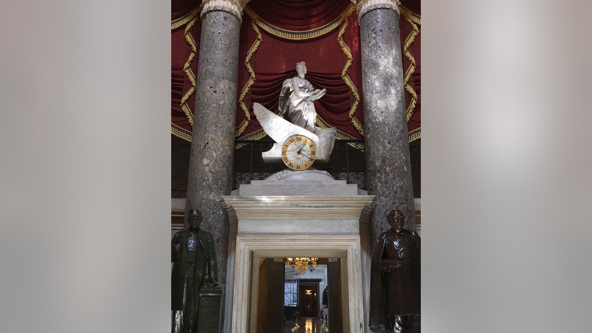 A statue of Clio leads from Statuary Hall to the Speaker’s Office and the Rotunda.