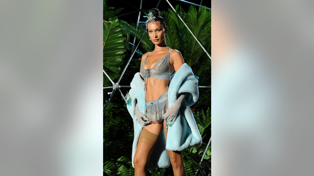 Rihanna announces upcoming lingerie line as she models a lacy bra from her  upcoming range 
