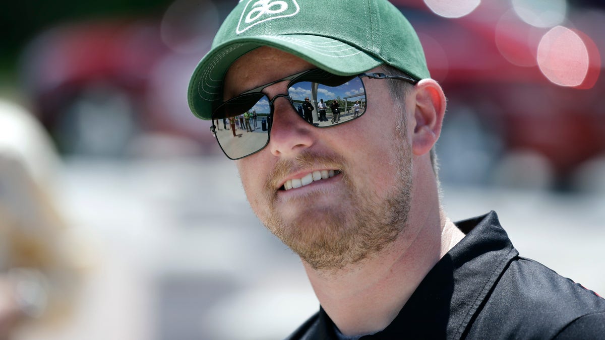 NASCAR driver Justin Allgaier looks on during a promotion for the DuPont Pioneer 250 NASCAR Nationwide Series auto race to be held in June at the Iowa Speedway, Monday, May 20, 2013, in Des Moines, Iowa. Allgaier is 4th in the Nationwide standings even though a win has eluded him so far in 2013. (AP Photo/Charlie Neibergall)