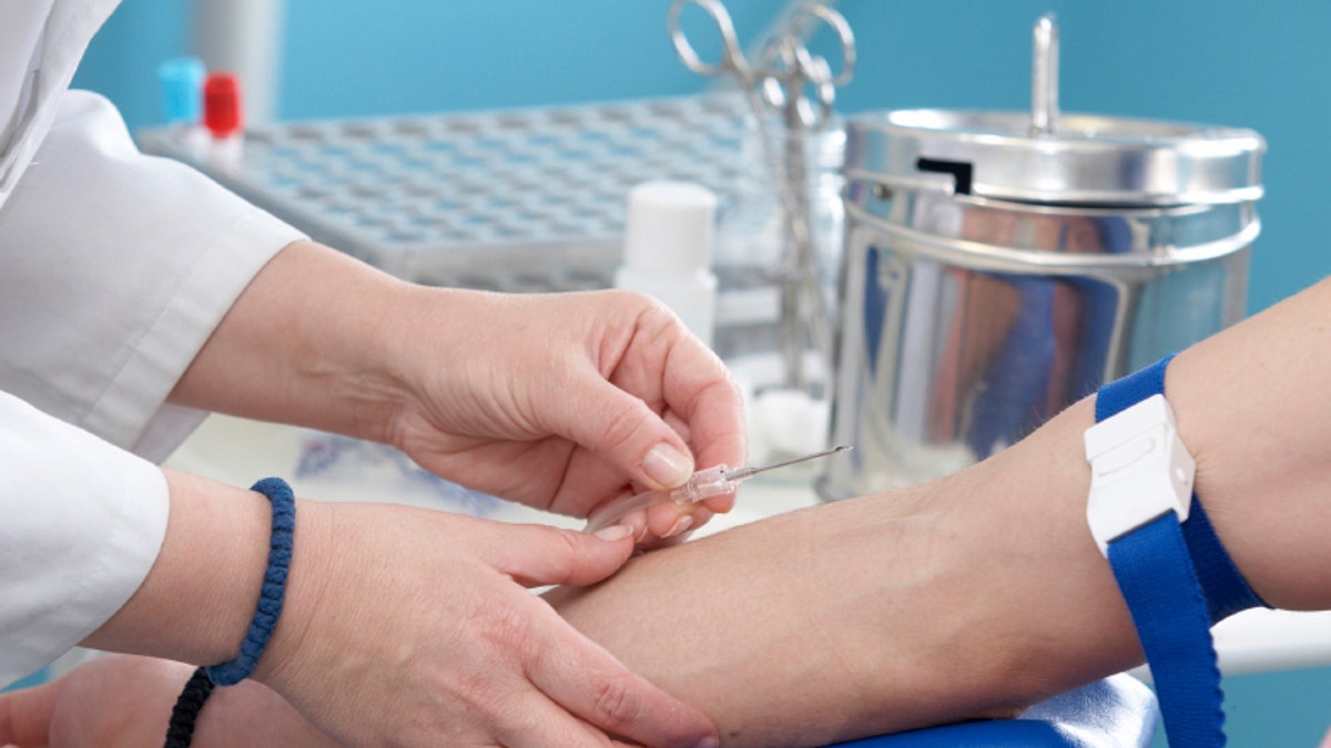 blood extraction closeup 4