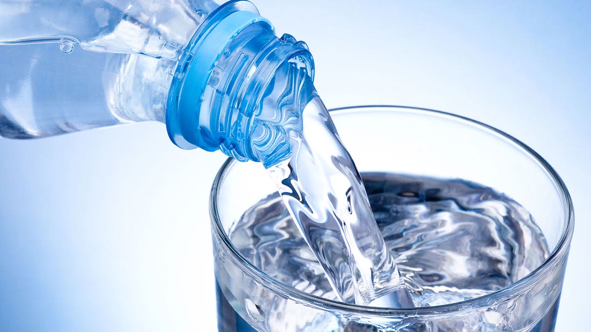 water bottle poured into cub