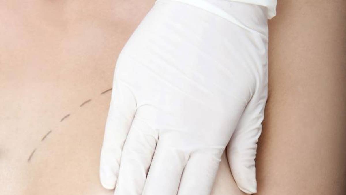 Doctor Working on Temporary Vacation Breasts for Women Looking