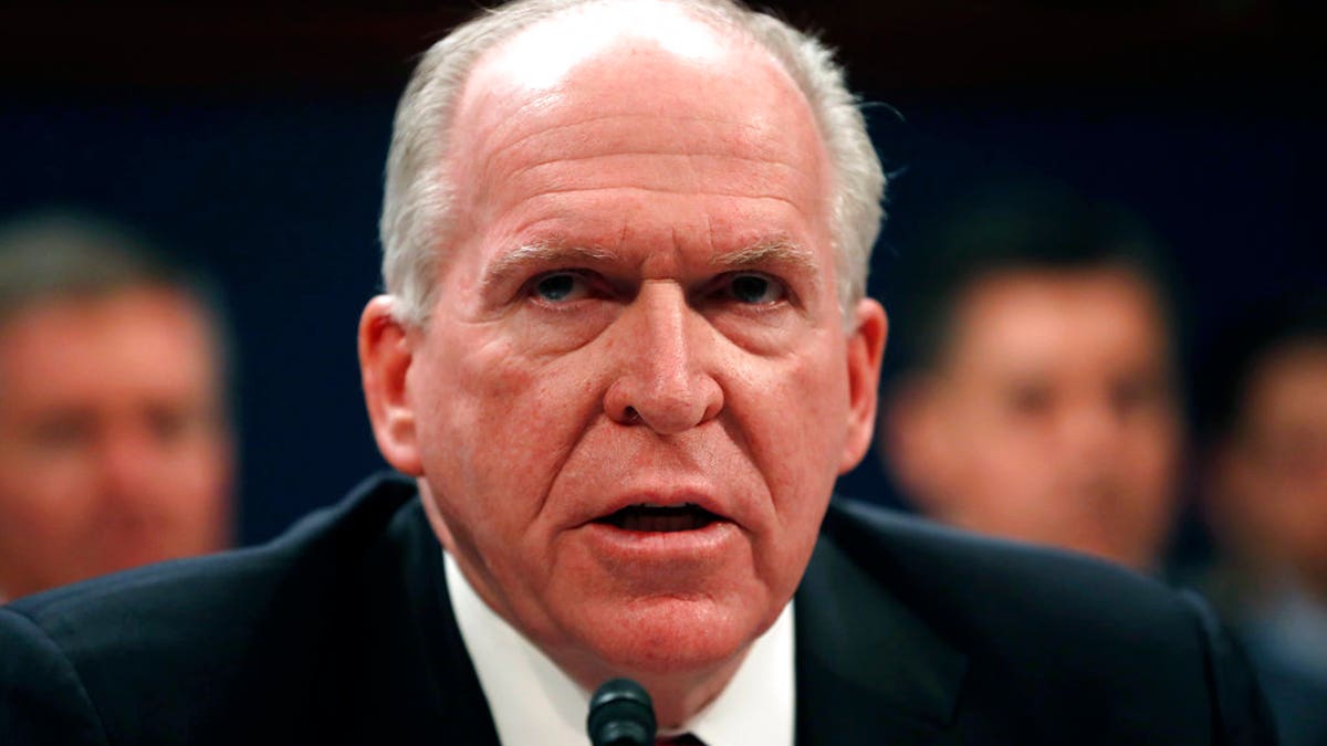 FILE - In this May 23, 2017, file photo, former CIA Director John Brennan testifies on Capitol Hill in Washington, before the House Intelligence Committee Russia Investigation Task Force. President Donald Trump is revoking the security clearance of former Obama administration CIA director Brennan (AP Photo/Pablo Martinez Monsivais, File)