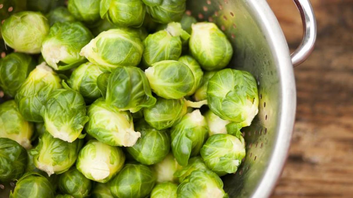 Brussels%20sprouts%20get%20a%20bad%20rap%2C%20but%20people%20who%20trash%20them%20obviously%20haven't%20tried%20roasting%20them%20with%20maple%20syrup.%20Begin%20by%20trimming%20and%20washing%20your%20sprouts%2C%20then%20slice%20each%20lengthwise.%20Toss%20them%20with%20maple%20syrup%20and%20olive%20oil%20(about%20one%20tablespoon%20each%20per%20pound%20of%20sprouts)%20and%20lay%20them%20out%20on%20a%20baking%20sheet.%20Roast%20for%2010%20minutes%20at%20400%20degrees.%20Remove%20the%20sprouts%20and%20jostle%20them%20around%2C%20then%20put%20them%20back%20in%20the%20oven%20and%20continue%20roasting%20for%20another%2010%20minutes%20(or%20until%20done).%20Sprinkle%20with%20salt%20and%20pepper%2C%20then%20serve.%0A