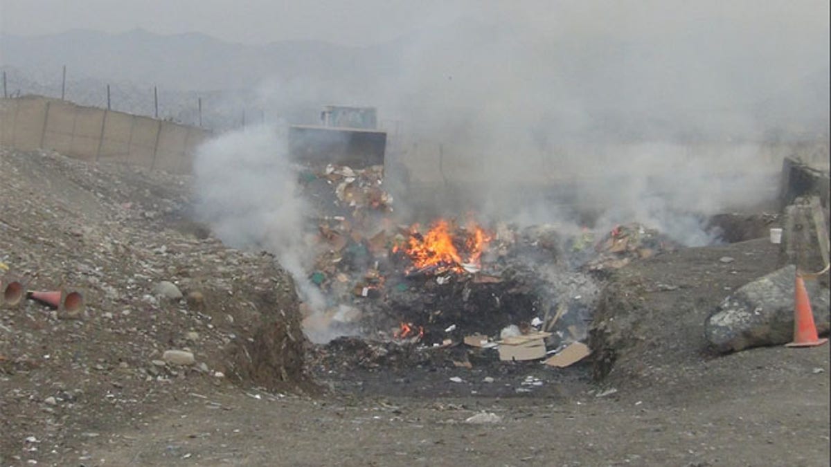 Shown here is a burn pit at Shindand Air Base in Afghanistan. 