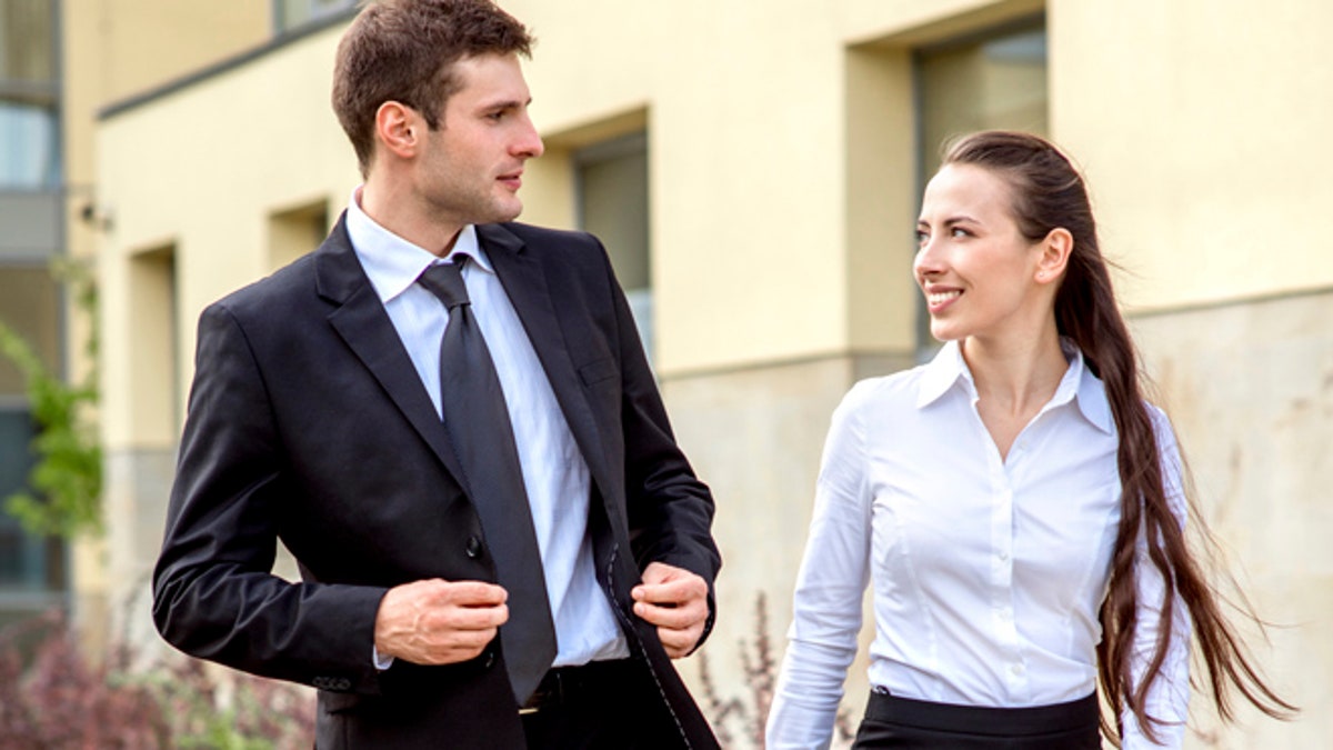 Young business couple outdoor