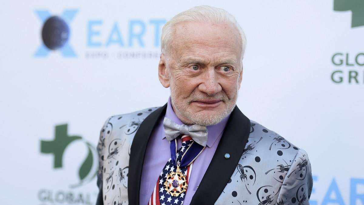 FILE - In this Feb. 28, 2018, file photo, Buzz Aldrin attends the 15th annual Global Green Pre-Oscar Gala, at NeueHouse Hollywood in Los Angeles. Aldrin is suing two of his children and a business manager, accusing them of misusing his credit cards, transferring money from an account and slandering him by saying he has dementia. (Photo by Richard Shotwell/Invision/AP, File)