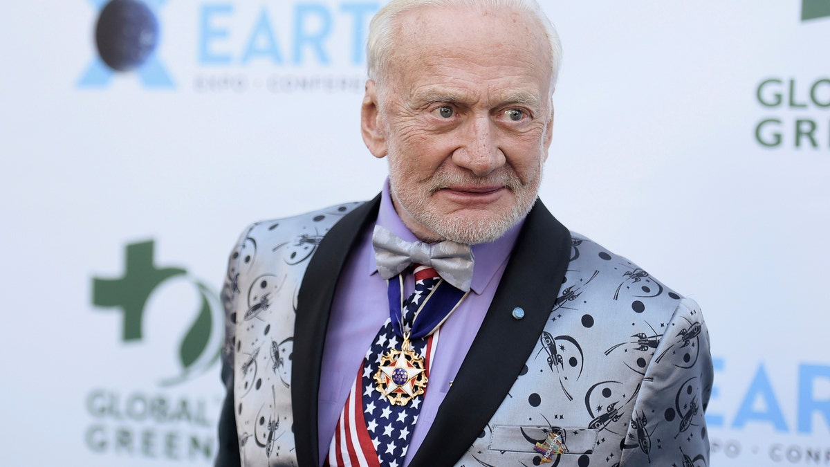 FILE - In this Feb. 28, 2018, file photo, Buzz Aldrin attends the 15th annual Global Green Pre-Oscar Gala, at NeueHouse Hollywood in Los Angeles. Aldrin is suing two of his children and a business manager, accusing them of misusing his credit cards, transferring money from an account and slandering him by saying he has dementia. (Photo by Richard Shotwell/Invision/AP, File)