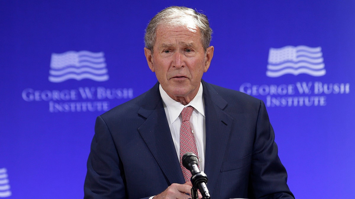 FILE- In this Thursday, Oct. 19, 2017 file photo, former U.S. President George W. Bush speaks at a forum sponsored by the George W. Bush Institute in New York. Bush spoke Thursday at a summit in Abu Dhabi put on by the Milken Institute, an economic think tank based in Santa Monica, California. (AP Photo/Seth Wenig, File)